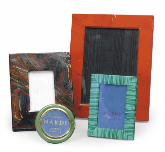 A GROUP OF THREE HARDSTONE VENEERED FRAMES AND A JADE FRAME,