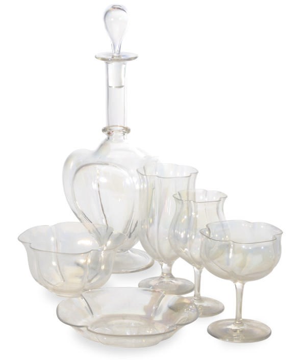 A SET OF IRIDSCENT LOBED GLASSWARE,