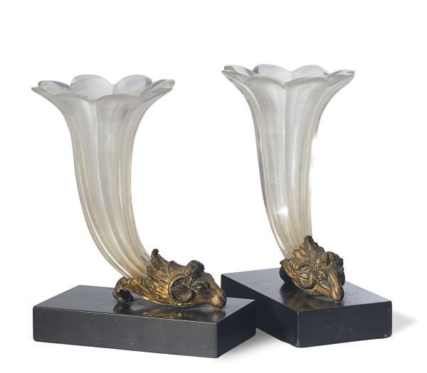 A PAIR OF CONTINENTAL GLASS TRUMPET VASES WITH GILT-METAL RAMS HEAD MOUNTS,