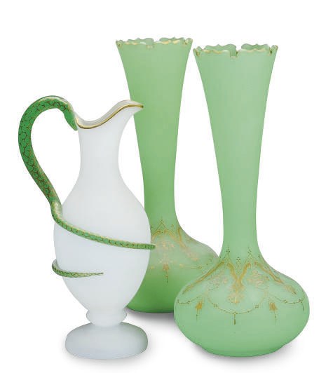 A PAIR OF CONTINENTAL GILT GREEN GLASS BOTTLE VASES AND AN OPALINE GLASS EWER WITH SNAKE-FORM HANDLE,