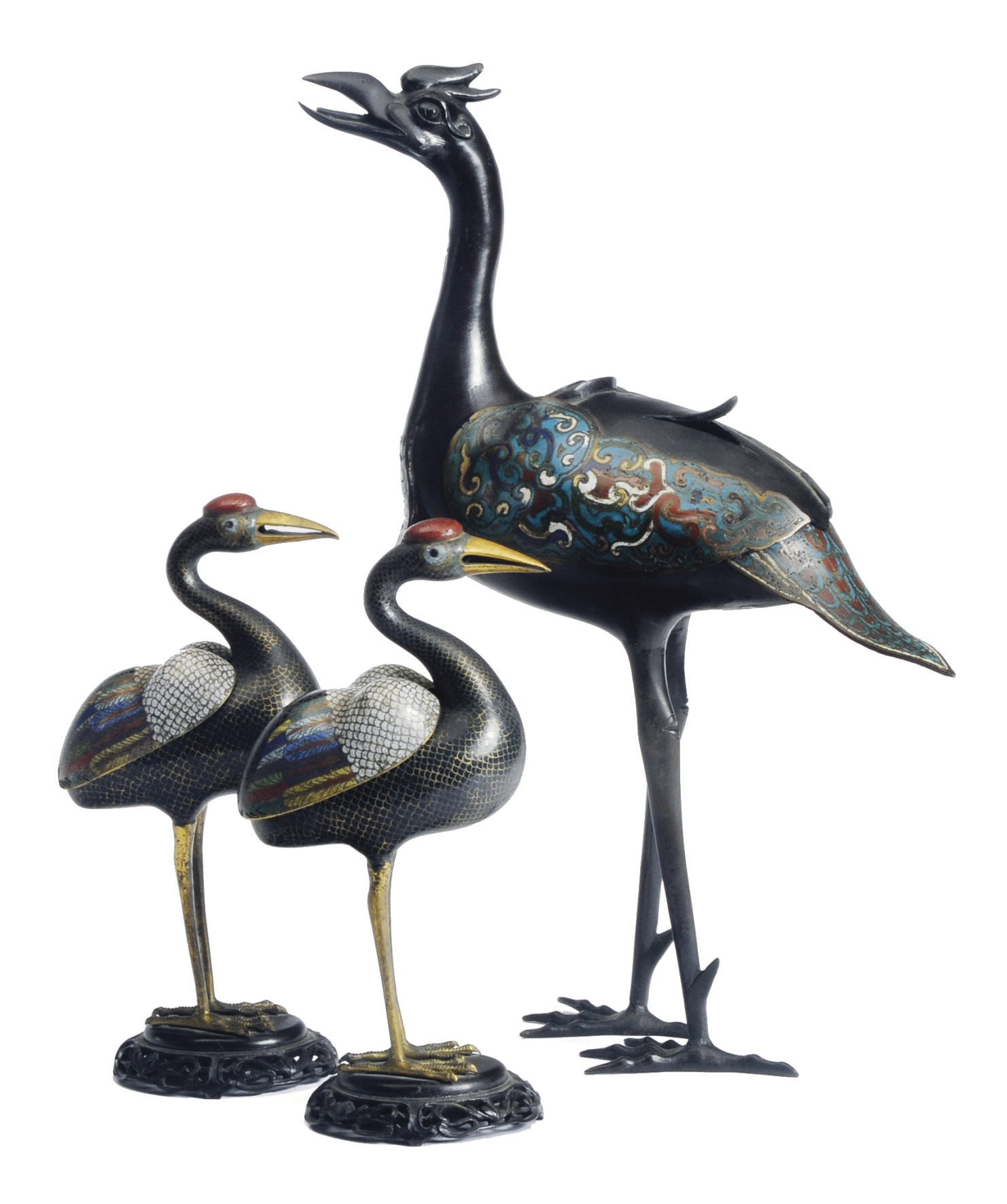 A CHINESE CLOISONNE ENAMEL CRANE-FORM CENSER AND A PAIR OF MODELS OF CRANES ON WOOD STANDS,