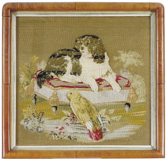 A PAINTED VELVET AND NEEDLEWORK OF A SPANIEL AND PARROT FIRESCREEN,