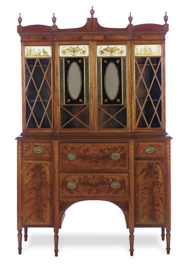 AN AMERICAN MAHOGANY AND VERRE EGLOMISE SECRETARY-CABINET,