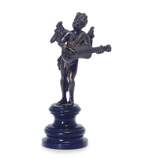 A PATINATED BRONZE FIGURE OF A MUSICAL PUTTO,