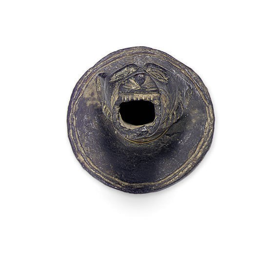 A NORTH EUROPEAN BRONZE FIGURAL SPOUT,