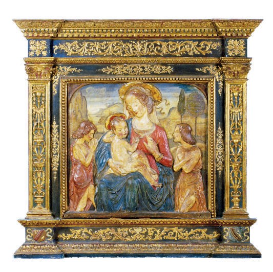 AN ITALIAN POLYCROME-DECORATED TERRACOTTA RELIEF PANEL,