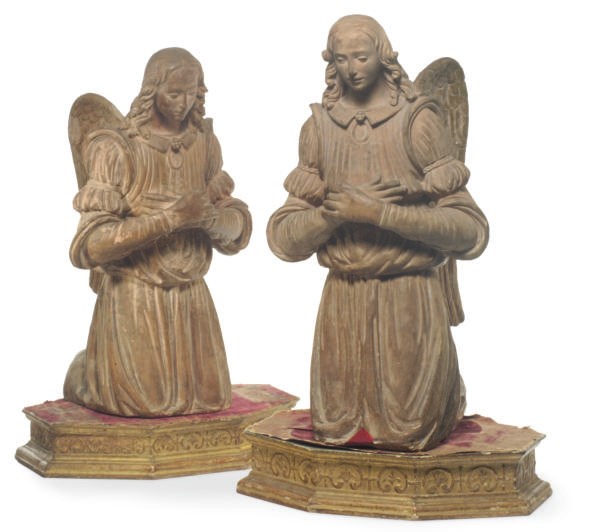 A PAIR OF TERRACOTTA FIGURES OF ANGELS,
