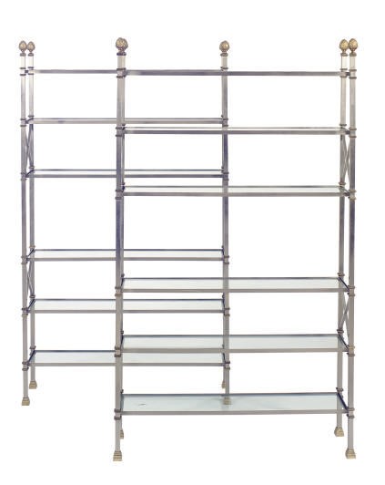 A PAIR OF GILT-METAL MOUNTED STEEL BOOKCASES,