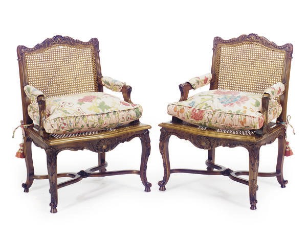 A PAIR OF WALNUT AND CANED FAUTEUILS,