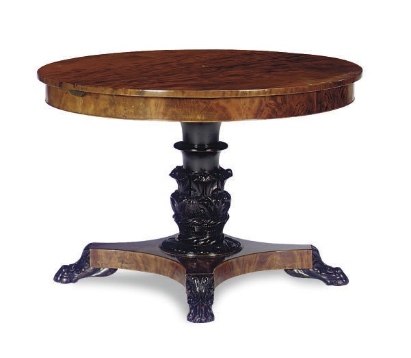 AN ENGLISH MAHOGANY AND PART-EBONIZED EXTENDING DINING TABLE,