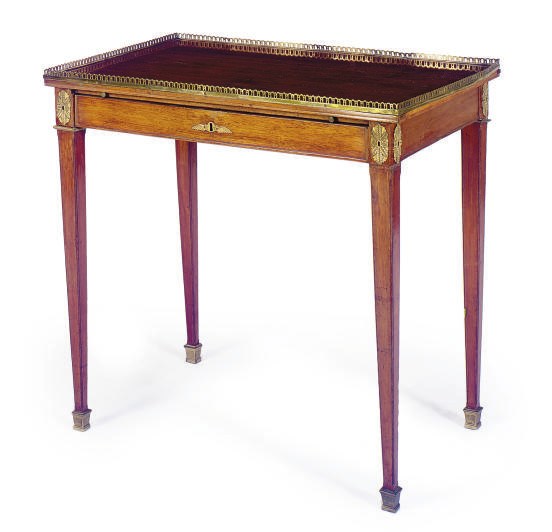 A BALTIC ORMOLU-MOUNTED MAHOGANY WRITING TABLE,