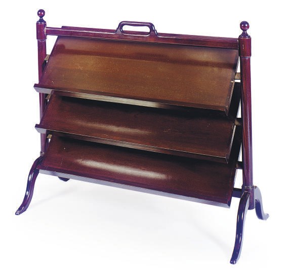 A MAHOGANY ADJUSTABLE MAGAZINE RACK,