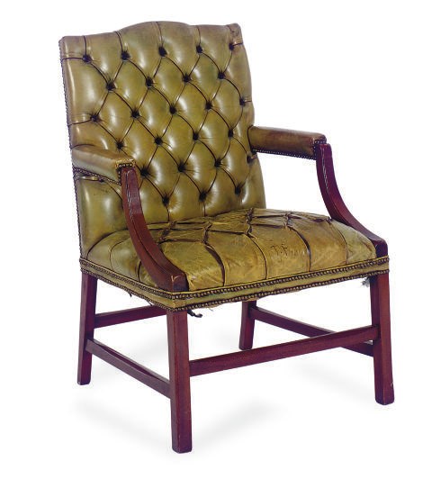 AN ENGLISH MAHOGANY AND TUFTED-LEATHER UPHOLSTERED ARMCHAIR,