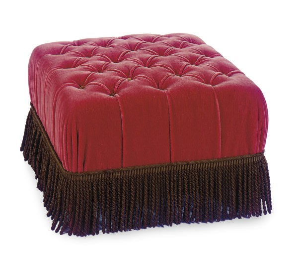 A TUFTED RED VELVET UPHOLSTERED POUF,