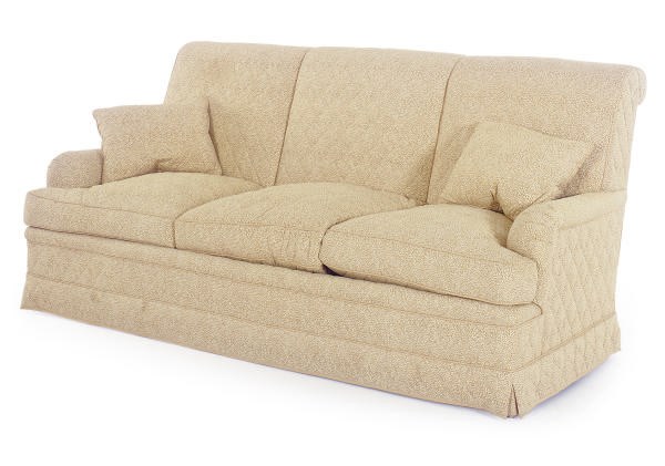 A THREE-SEAT QUILTED COTTON UPHOLSTERED SOFA,