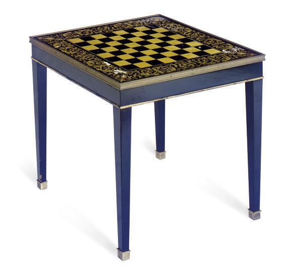 A GILT-METAL MOUNTED, EBONIZED AND PARCEL-GILT LOW GAMES TABLE,