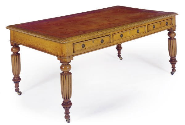 A VICTORIAN OAK LIBRARY TABLE,