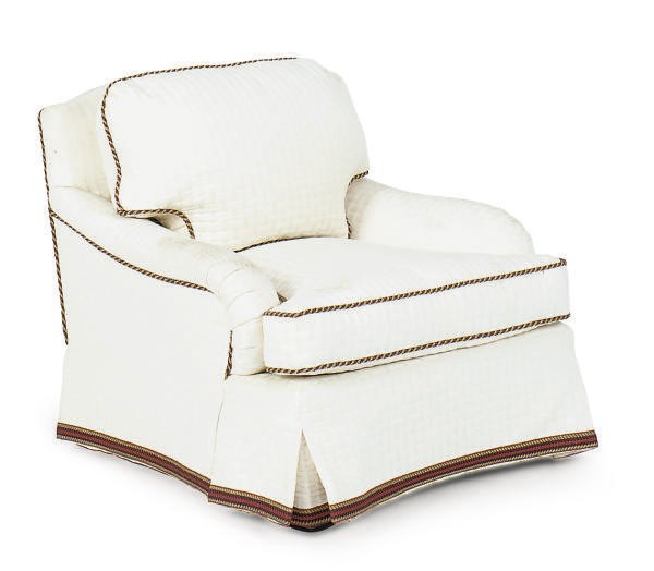 AN UPHOLSTERED CLUB CHAIR,