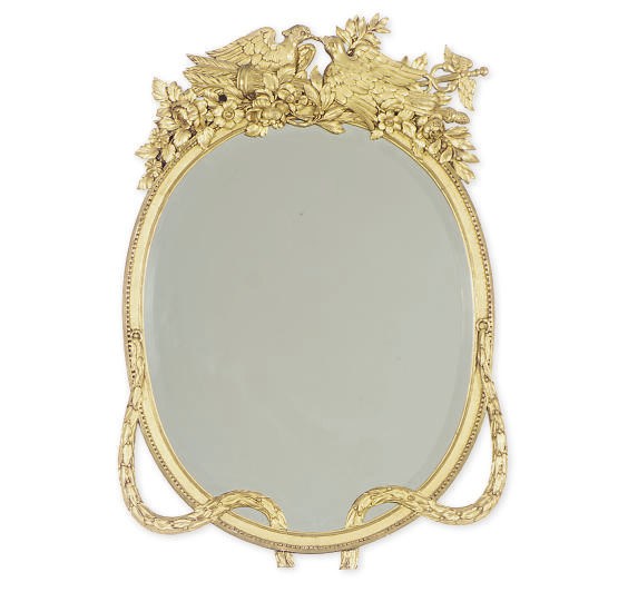 A GILTWOOD OVAL MIRROR,