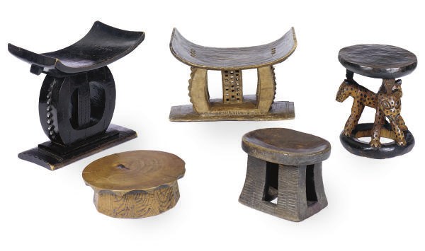 A GROUP OF AKAN AND CAMEROON STOOLS,