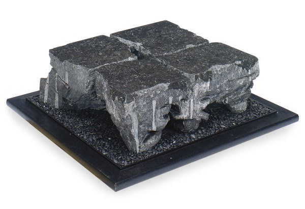 A BLACK MARBLE AND EBONISED LOW TABLE,