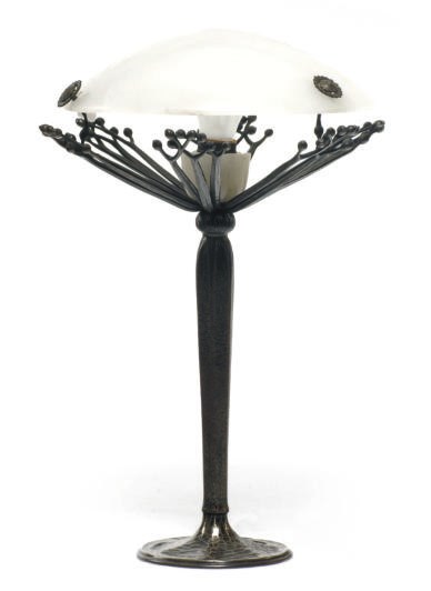 A WROUGHT IRON AND ALABASTER TABLE LAMP,