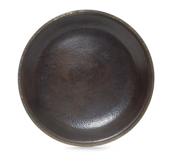 A HAMMERED COPPER CHARGER,