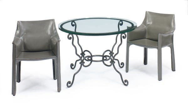 A SET OF FOUR LEATHER 'CAB' ARMCHAIRS,