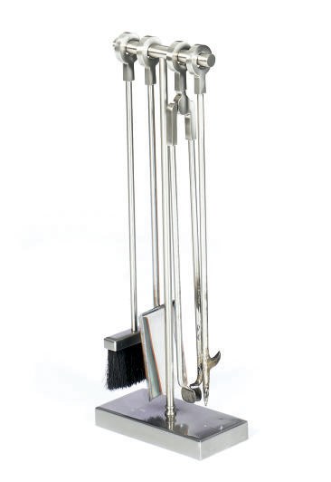 A SET OF BRUSHED STEEL FIRE TOOLS,