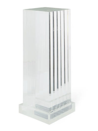 A LUCITE PEDESTAL,