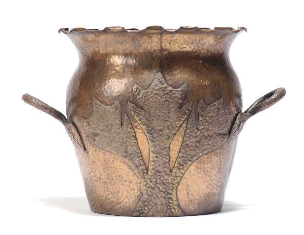 A HAMMERED COPPER TWIN-HANDLED JARDINIERE,
