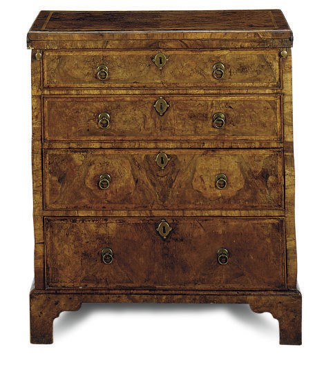 A GEORGE I WALNUT AND FEATHERBANDED BACHELOR'S CHEST-OF-DRAWERS,