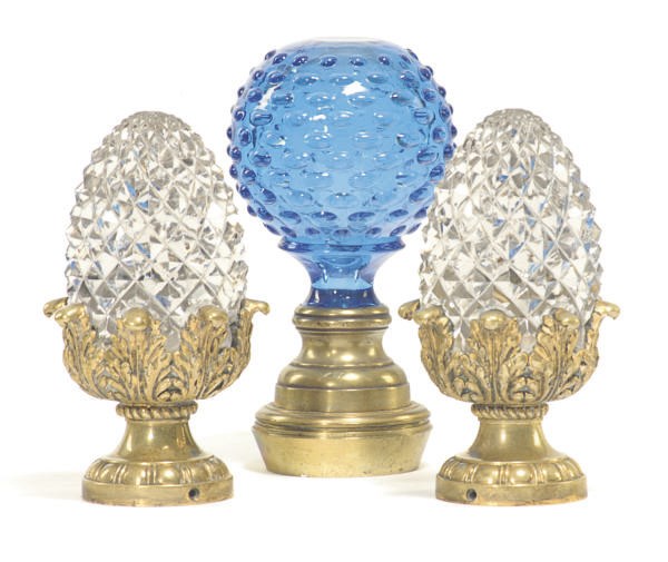 A PAIR OF GILT-BRONZE AND CUT-GLASS FINIALS,