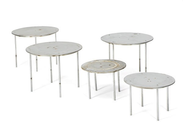 A GROUP OF FIVE CIRCULAR STEEL LOW TABLES,