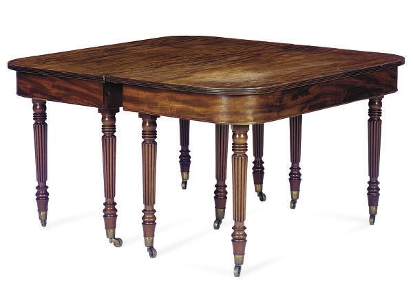A REGENCY MAHOGANY EXTENDING DINING TABLE,