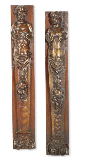 A PAIR OF NORTH EUROPEAN WALNUT TERM FIGURES,