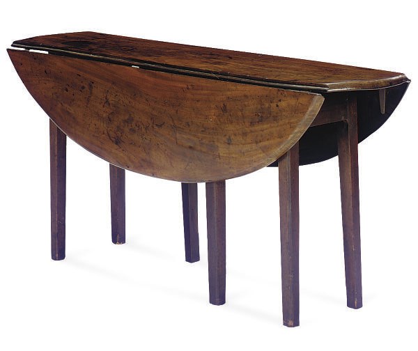A GEORGE III MAHOGANY DROP-LEAF DINING TABLE,