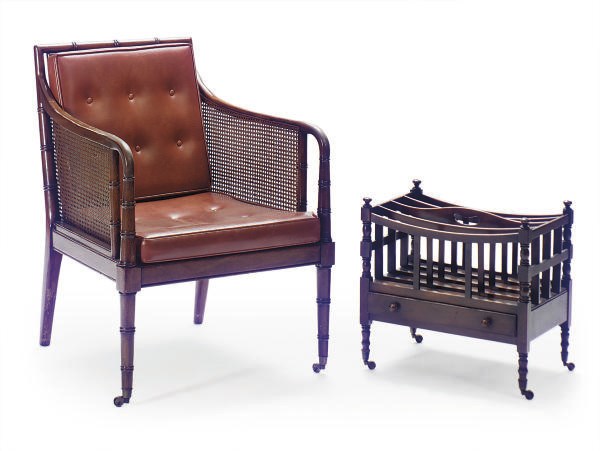 A MAHOGANY AND CANED LIBRARY ARMCHAIR,