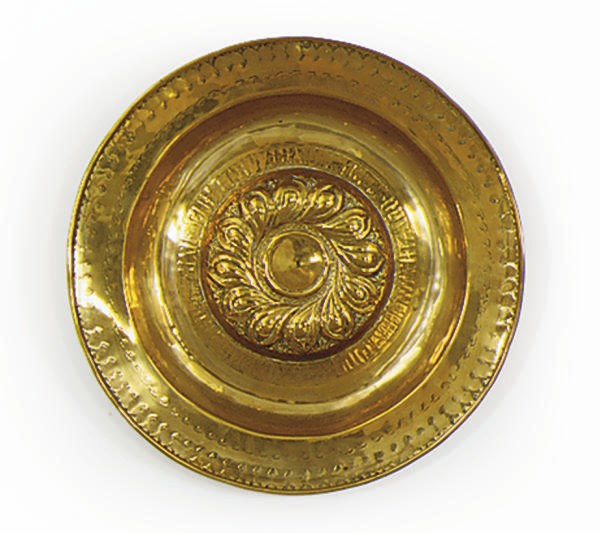 A GERMAN BRASS ALMS DISH,