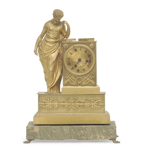 A CHARLES X GILT-BRONZE FIGURAL MANTELCLOCK,