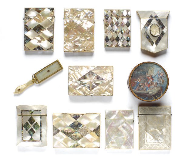 NINE VICTORIAN MOTHER-OF-PEARL CARD CASES**,