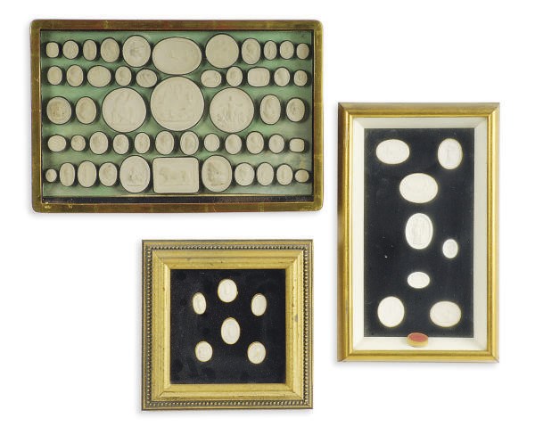 A GROUP OF FRAMED PLASTER SEALS,
