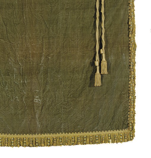 A PAIR OF GREEN PLUSH VELVET CURTAINS WITH GOLD PASSEMENTERIE TRIM,