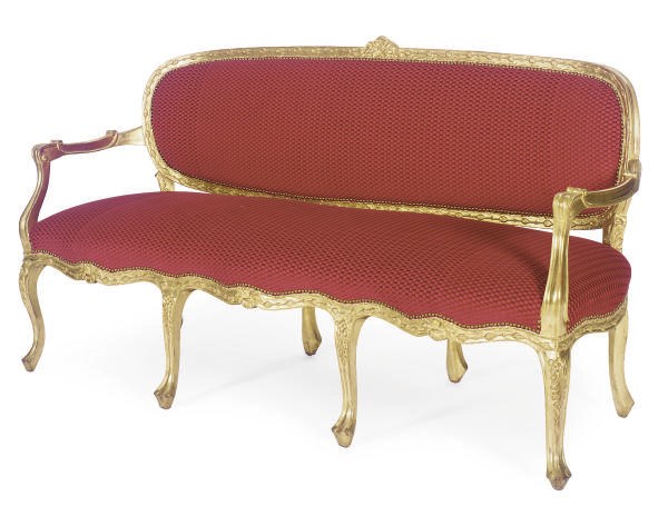 A GILTWOOD AND UPHOLSTERED SERPENTINE SETTEE,