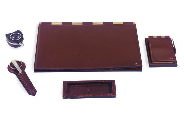 A FRENCH LEATHER DESK SET,