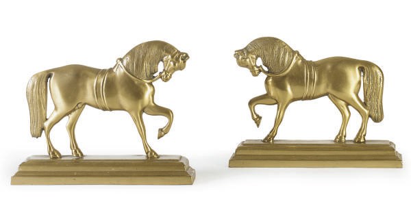 A PAIR OF GILT-METAL FIGURAL HORSE DOOR STOPS,