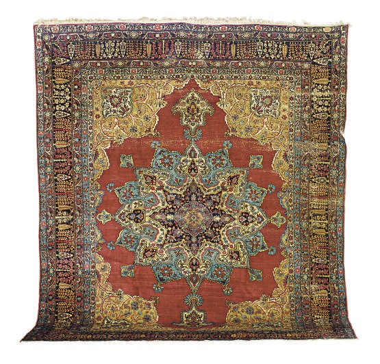A LAVAR KIRMAN CARPET,