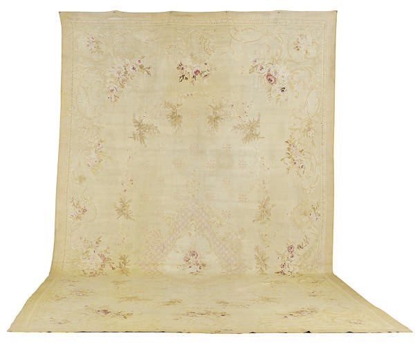AN AUBUSSON CARPET,