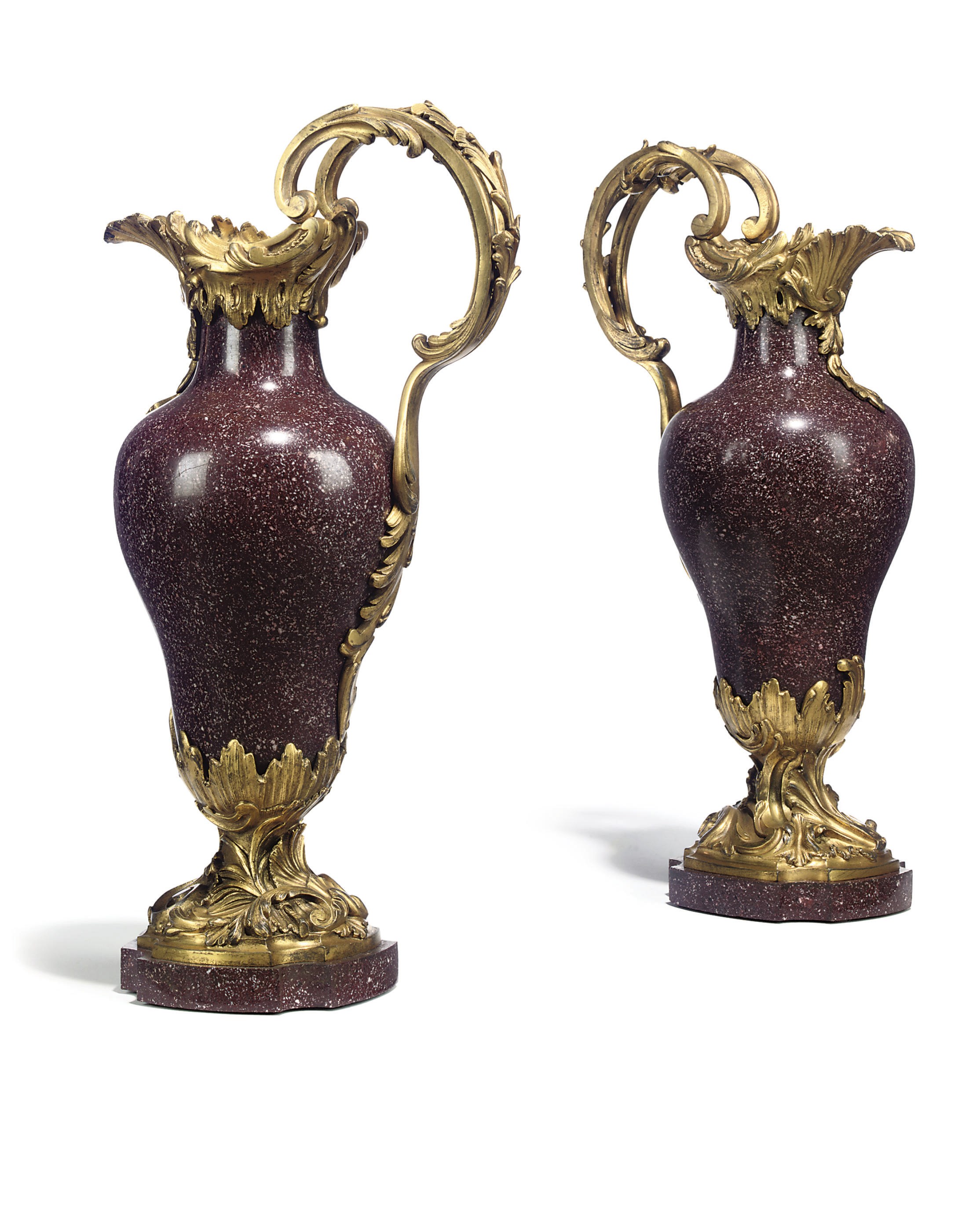 A PAIR OF ITALIAN ORMOLU-MOUNTED PORPHYRY EWERS
