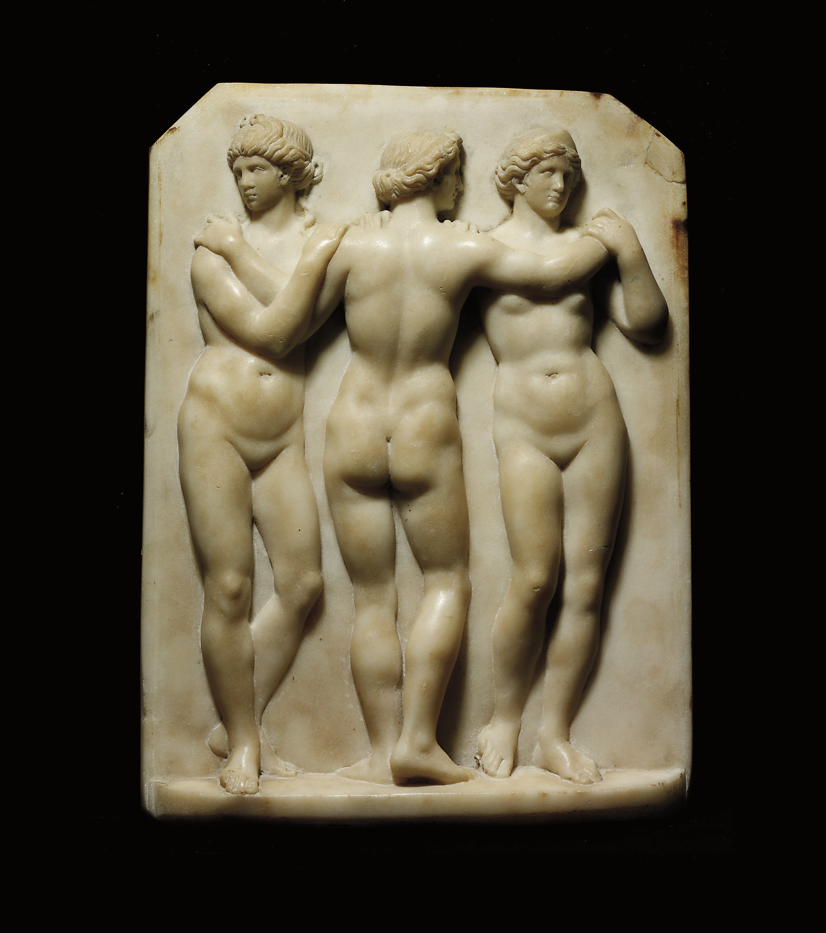 A RECTANGULAR CARVED MARBLE RELIEF OF THE THREE GRACES